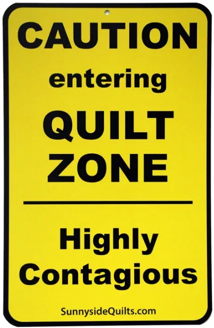 Novelty Sign: CAUTION entering QUILT ZONE.....